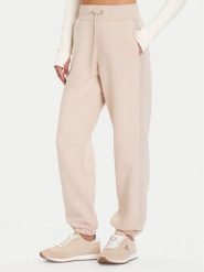 Guess Spodnie dresowe V5BB10 KB681 Beżowy Regular Fit. Brązowe spodnie dresowe damskie Guess, l, z aplikacjami, z bawełny. Za 299.99 zł.