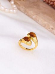 Pierres delicates Pozłacany pierścionek z tygrysim okiem rozmiar: onesize. Brązowe pierścionki damskie Pierres delicates, pozłacane. Za 39.99 zł.