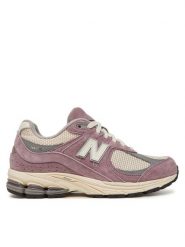 New Balance Sneakersy U2002RRB Fioletowy. Fioletowe obuwie sportowe damskie New Balance, ze skóry, bez zapięcia. Za 419.99 zł.
