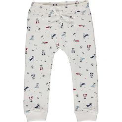Spodnie dresowe w kolorze białym. Białe spodnie niemowlęce Name it, z dresówki. W wyprzedaży za 35.95 zł.