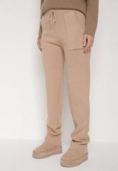 Ciemnobeżowe Sweterkowe Spodnie z Wełną z Ozdobnymi Kieszeniami Monilana. Brązowe spodnie materiałowe damskie Born2be, bez wzorów, z jeansu. Za 69.99 zł.