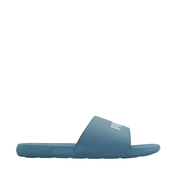 Klapki damskie Puma Cool Cat 2.0. Niebieskie klapki damskie Puma, bez wzorów, z materiału, bez obcasa, bez zapięcia. Za 79.00 zł.
