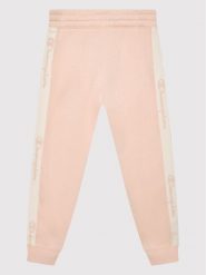 Champion Spodnie dresowe 404471 Różowy Regular Fit. Czerwone spodnie dresowe dziewczęce Champion, bez wzorów, z dresówki. Za 149.99 zł.