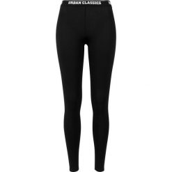 Damskie klasyczne legginsy miejskie. Czarne legginsy damskie Urban Classics, bez wzorów. Za 142.00 zł.