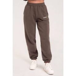 Spodnie fitness damskie Gym Glamour dresowe. Brązowe spodnie dresowe damskie GYM GLAMOUR, l, bez wzorów, z dresówki. Za 189.99 zł.