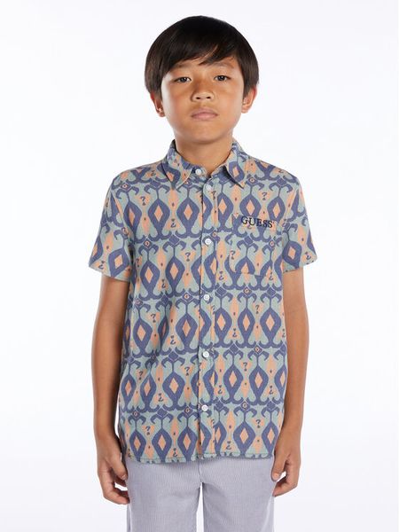 Guess Koszula L3GH02 WFBT0 Niebieski Regular Fit. Niebieskie koszule chłopięce Guess, z aplikacjami, z wiskozy, bez kołnierzyka, bez ramiączek. Za 169.99 zł.