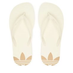 Japonki adidas. Białe klapki damskie Adidas, bez wzorów, bez obcasa, bez zapięcia. Za 89.99 zł.