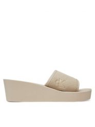 Calvin Klein Jeans Klapki Beach Wedge Slide Canvas YW0YW01725 Beżowy. Brązowe klapki damskie Calvin Klein Jeans, bez wzorów, z jeansu, bez obcasa, bez zapięcia. Za 139.99 zł.