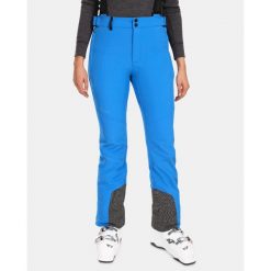 Damskie softshellowe spodnie narciarskie Kilpi RHEA-W. Niebieskie spodnie sportowe damskie Kilpi, na zimę, m, bez wzorów, narciarskie. Za 401.40 zł.