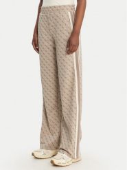 Guess Spodnie dresowe V6GB04 K2955 Beżowy Regular Fit. Brązowe spodnie dresowe damskie Guess, m, z aplikacjami, z dresówki. Za 519.99 zł.