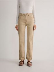 Jeansy straight z efektem sprania - beżowy. Brązowe jeansy damskie Reserved. W wyprzedaży za 79.99 zł.