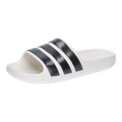 Klapki adidas Adilette Flow. Białe klapki damskie Adidas, bez wzorów, z materiału, bez obcasa, bez zapięcia. Za 167.00 zł.