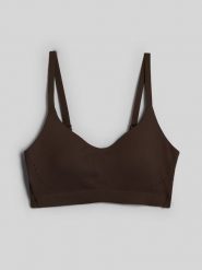 4F Biustonosz do jogi z niskim wsparciem damski - brązowy XL. Brązowe biustonosze sportowe damskie 4F, bez wzorów. Za 129.99 zł.