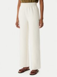 Armani Exchange Spodnie dresowe XW002840 AF21298 U1003 Kremowy Regular Fit. Białe spodnie dresowe damskie Armani Exchange, m, bez wzorów, z bawełny. Za 599.99 zł.