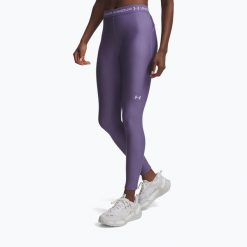 Legginsy treningowe damskie Under Armour HeatGear. Fioletowe obuwie sportowe damskie Under Armour, bez zapięcia, na fitness i siłownię. Za 129.99 zł.