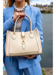 Victor & Hugo Paris Skórzana torebka "Beryn" w kolorze kremowym - 31 x 22 x 11,5 cm rozmiar: onesize. Brązowe torebki klasyczne damskie Victor & Hugo Paris, z materiału, przez ramię, bez dodatków. Za 347.99 zł.