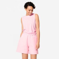 Koszulka fitness damska bez rękawów. Czerwone koszulki damskie Decathlon, xs, bez wzorów, z elastanu, bez kołnierzyka, bez ramiączek. Za 84.99 zł.