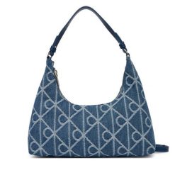 Torebka Calvin Klein. Niebieskie torebki klasyczne damskie Calvin Klein, z denimu, bez dodatków. Za 489.99 zł.
