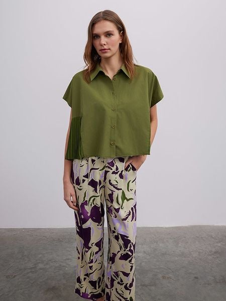 BGN Bluzka w kolorze zielonym rozmiar: 38. Zielone bluzki damskie BGN, bez wzorów, bez kołnierzyka, bez ramiączek. Za 92.42 zł.