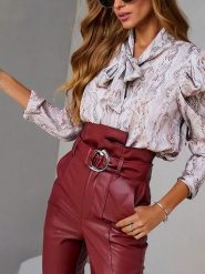 Milan Kiss Bluzka w kolorze kremowym rozmiar: M. Brązowe bluzki damskie Milan Kiss, m, bez wzorów, bez kołnierzyka, bez ramiączek. Za 117.73 zł.