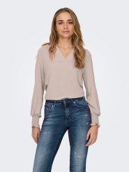 ONLY Bluzka w kolorze jasnoróżowym rozmiar: XL. Różowe bluzki damskie Only, xl, bez wzorów, bez kołnierzyka, bez ramiączek. Za 88.02 zł.