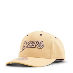 Czapka typu snapback Los Angeles Lakers. Żółte czapki z daszkiem damskie Mitchell & Ness, bez wzorów. Za 190.50 zł.