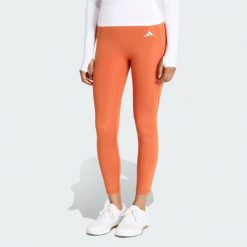 Legginsy 7/8 bez szwu z przodu Optime Essentials. Brązowe legginsy damskie Adidas, bez wzorów. Za 219.00 zł.