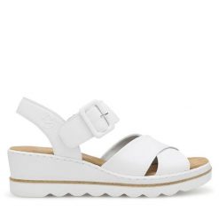 Sandały Rieker. Białe sandały damskie Rieker, bez wzorów, bez obcasa, na koturnie, bez zapięcia. Za 299.99 zł.