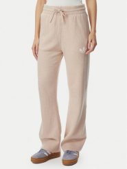 Adidas Spodnie dresowe Essentials KR9180 Beżowy Loose Fit. Brązowe spodnie dresowe damskie Adidas, m, bez wzorów, z bawełny. Za 299.99 zł.