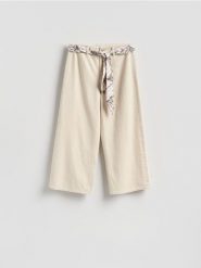 Jeansy culotte z opaską - kremowy. Białe jeansy damskie Reserved. Za 139.99 zł.