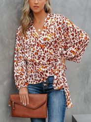 LA Angels Bluzka w kolorze biało-pomarańczowym rozmiar: M. Białe bluzki damskie LA Angels, m, bez wzorów, bez kołnierzyka, bez ramiączek. Za 104.99 zł.