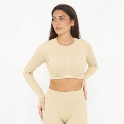 Koszulka Crop Top treningowa IMALA długie rękawy. Brązowe koszulki damskie LEGEA, bez wzorów, z elastanu, bez kołnierzyka, bez ramiączek. W wyprzedaży za 95.50 zł.