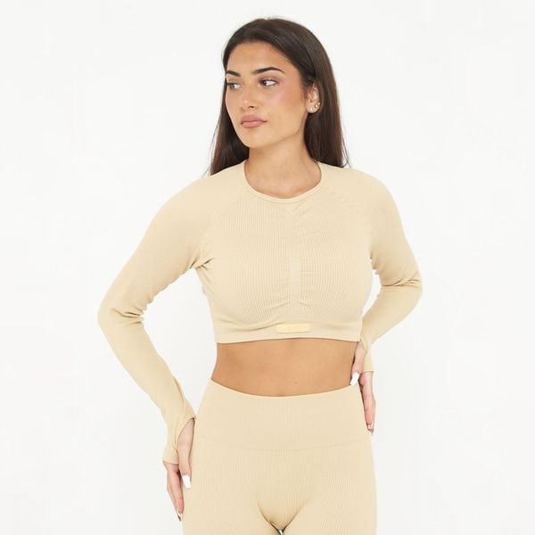 Koszulka Crop Top treningowa IMALA długie rękawy. Brązowe koszulki damskie LEGEA, bez wzorów, z elastanu, bez kołnierzyka, bez ramiączek. W wyprzedaży za 95.50 zł.