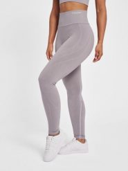 Legginsy damskie Hummel MT Flow. Fioletowe legginsy damskie Hummel, xs, bez wzorów, z dzianiny. Za 228.15 zł.