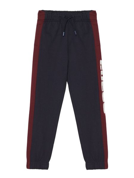 Guess Spodnie dresowe L6RB01 KA6R4 Granatowy Regular Fit. Niebieskie spodnie dresowe chłopięce Guess, z bawełny. Za 199.99 zł.