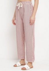 Różowo-Czarne Spodnie w Geometryczny Print z Wysokim Stanem Lolla. Czerwone spodnie materiałowe damskie Born2be, bez wzorów, z jeansu. Za 29.99 zł.
