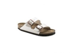 Klapki Birkenstock Arizona Birko Flor Damskie. Białe klapki damskie Birkenstock, bez wzorów, ze skóry, bez obcasa, bez zapięcia. Za 529.20 zł.