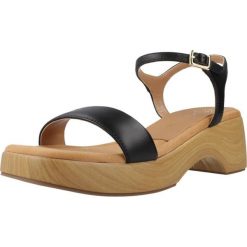 Sandały UNISA IRITA NTO Czarny. Czarne sandały damskie Unisa, bez wzorów, ze skóry, bez obcasa, bez zapięcia. Za 353.99 zł.