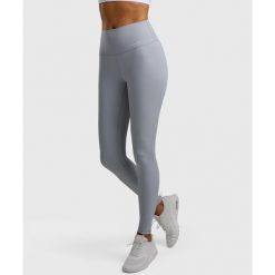 Legginsy sportowe damskie. Niebieskie legginsy sportowe damskie NORDICDOTS, bez wzorów, z materiału, tenisowe. Za 365.00 zł.