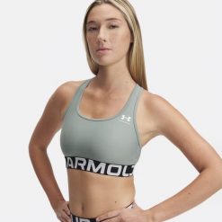 Stanik sportowy Under Armour HeatGear Authentics Mid Branded Bra. Zielone biustonosze sportowe damskie Under Armour, bez wzorów. Za 102.99 zł.