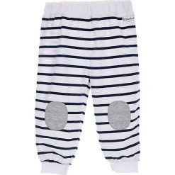Spodnie w kolorze biało-granatowym. Białe spodnie niemowlęce Little Marcel, z aplikacjami. W wyprzedaży za 45.95 zł.