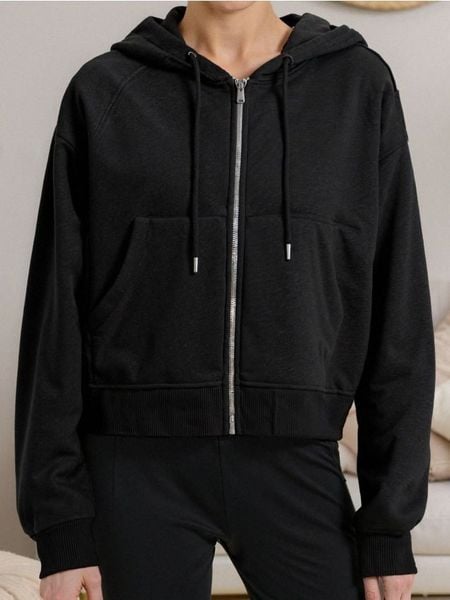 Bluza z kapturem z zapięciem - czarny. Czarne bluzy damskie Sinsay, l, bez wzorów, z kapturem. Za 39.99 zł.