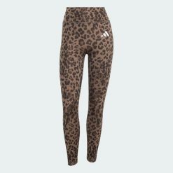 Legginsy Optime Essentials 3-Stripes Leopard 7/8. Brązowe legginsy damskie Adidas, l, bez wzorów, z elastanu. Za 219.00 zł.