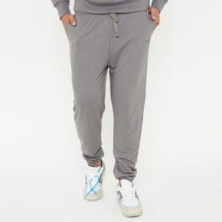 Spodnie sportowe unisex F BALLON szare. Szare obuwie sportowe damskie LEGEA, bez wzorów, z gumy, na fitness i siłownię. W wyprzedaży za 92.00 zł.