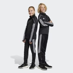 Tiro 23 Club Training Pants. Białe spodnie dresowe damskie Adidas, bez wzorów, z dresówki. Za 110.99 zł.