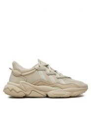Adidas Sneakersy Ozweego FX6029 Beżowy. Brązowe obuwie sportowe damskie Adidas, z materiału, bez zapięcia. Za 389.99 zł.