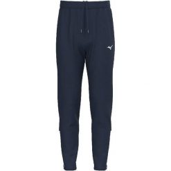 Spodnie treningowe Mizuno Team BGRB. Niebieskie spodnie sportowe damskie Mizuno, l, bez wzorów, z materiału, do biegania. Za 152.00 zł.