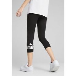 Damskie legginsy 3/4 z małym logo No. 1 ESS PUMA Black. Czarne legginsy damskie Puma, l, bez wzorów, z gumy. W wyprzedaży za 89.00 zł.