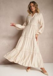 Beżowa Wiskozowa Sukienka o Rozkloszowanym Kroju z Koronką Gonalorin. Brązowe sukienki damskie Renee, z aplikacjami, z koronki, eleganckie, bez ramiączek. W wyprzedaży za 127.99 zł.