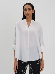 Someday Bluzka w kolorze kremowym rozmiar: 36. Brązowe bluzki damskie someday., bez wzorów, z bawełny, bez kołnierzyka, bez ramiączek. Za 186.95 zł.